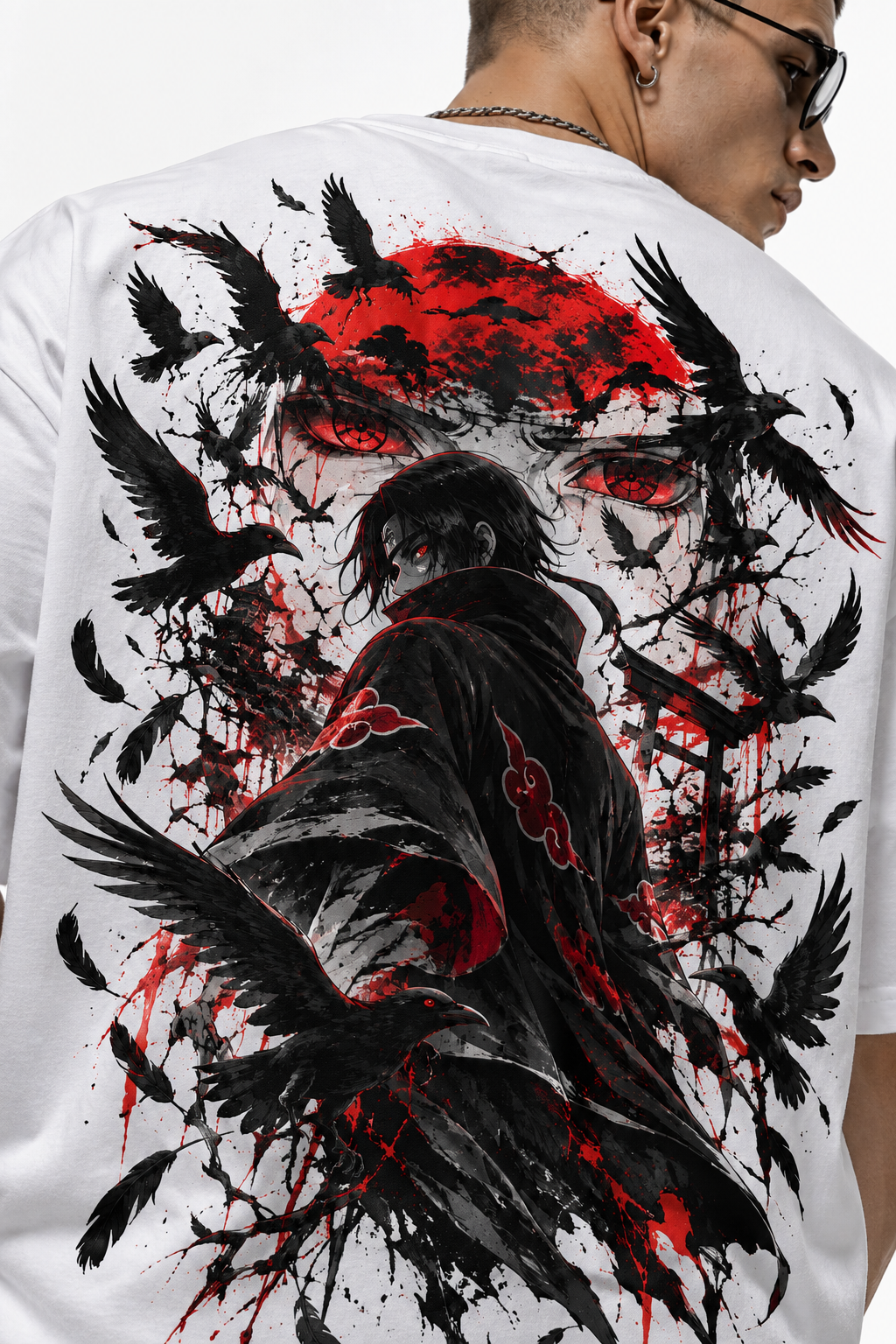 Itachi Crow Oversized Tee 4 Close-up of Itachi Crow Oversized Tee back artwork with dark-cloaked character and red circular graphic